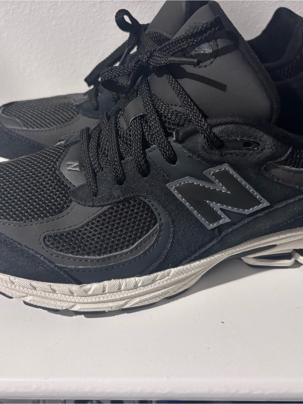 New Balance Men's Black and White Athletic Sneakers